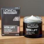 L'Oréal Men Expert Vita Lift cream jar and packaging on wooden surface
